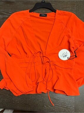 Tie-Front Peplum Blouse by ASTR the Label in Vibrant Orange